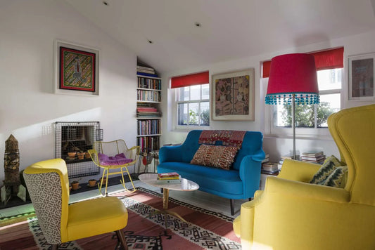 Living room with red, blue, and yellow accents.